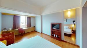 Μια τηλεόραση ή/και κέντρο ψυχαγωγίας στο Hotel Horison Arcadia Heritage Surabaya