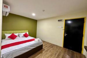 Postel nebo postele na pokoji v ubytování Hotel MSP Bukit Bintang