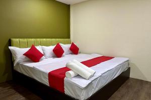 Postel nebo postele na pokoji v ubytování Hotel MSP Bukit Bintang
