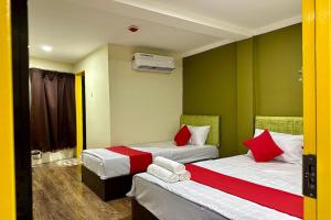 Postel nebo postele na pokoji v ubytování Hotel MSP Bukit Bintang
