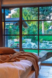 Ένα ή περισσότερα κρεβάτια σε δωμάτιο στο Thomhof Chalets