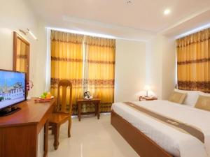 Kirirom Crystal Hotel客房内的一张或多张床位