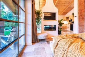Η κουζίνα ή μικρή κουζίνα στο Thomhof Chalets