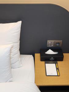 Postel nebo postele na pokoji v ubytování Hound Hotel Busan Station