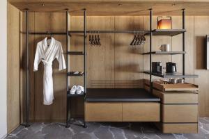 a dressing room with a white robe and shoes at Hyatt Regency Tokyo in Tokyo