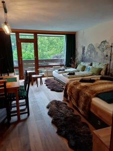 Posteľ alebo postele v izbe v ubytovaní Grubhof Treetops