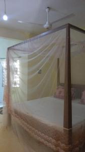 Rúm í herbergi á Peponi Watamu