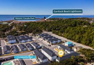 an aerial view of a parking lot at a resort at BCW32A - Sea Escape in Corolla