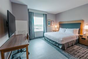 Homewood Suites By Hilton Buford Mall Of Ga客房内的一张或多张床位