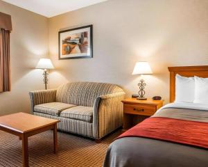 Postel nebo postele na pokoji v ubytování Quality Inn