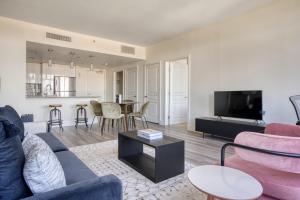 a living room with a couch and a table at Mountain View 2BR w Gym Lounge nr Highways SFO-1080 in Los Altos