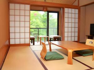 โทรทัศน์และ/หรือระบบความบันเทิงของ Hotel Yamanakako Garden Villa