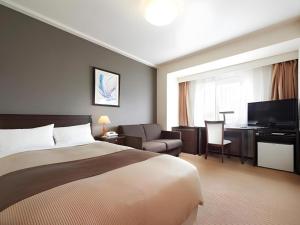 Voodi või voodid majutusasutuse Hotel Sealuck Pal Kofu toas +68 fotot