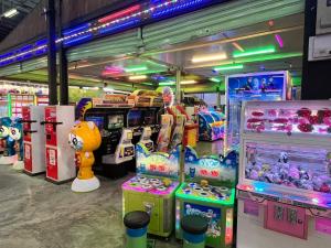 a arcade with several video games in a store at Nova Mountain n Sunrise view Hilltop Hotel Apartment in Cameron Highlands in Cameron Highlands