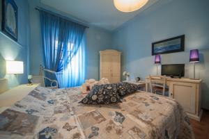 Postel nebo postele na pokoji v ubytování Albergo Etruria