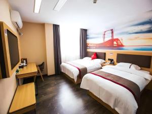 TV a/nebo společenská místnost v ubytování Thank Inn Hotel Guangdong Zhuhai Jiwan Hongqi Central Sqaure