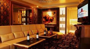 a living room with a couch and a television at Maleewana Hotel & Resort in Bang Yai +90 photos