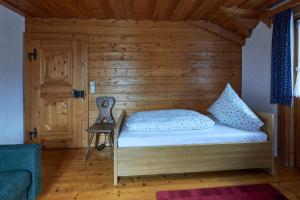 Ένα ή περισσότερα κρεβάτια σε δωμάτιο στο Chalet bei Marktbreit