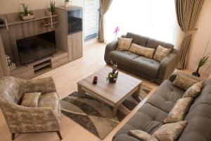 Posezení v ubytování Capitоl Suites & Apartments