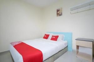 Postel nebo postele na pokoji v ubytování OYO 89717 Budget Star Hotel