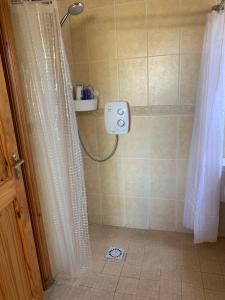 a shower in a bathroom with a shower curtain at 39 woodview in Listowel +61 photos