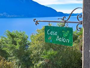 a sign that reads casa babion hanging from a building at Casa Balon in Oggebio