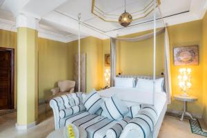 Postel nebo postele na pokoji v ubytování Riad Du Golf Suites - Marrakech