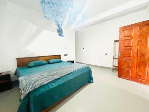 Llit o llits en una habitació de Bella Ella