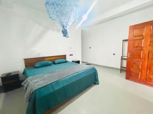 Llit o llits en una habitació de Bella Ella