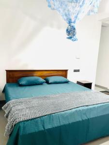 Llit o llits en una habitació de Bella Ella