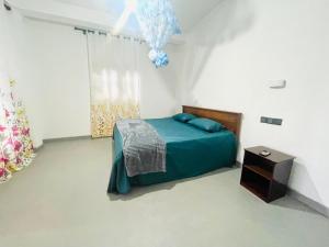 Llit o llits en una habitació de Bella Ella