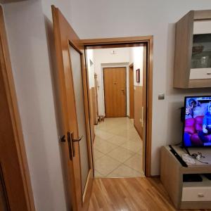 TV a/nebo společenská místnost v ubytování Le Pepina + 18 fotografií