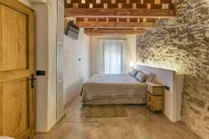 Postel nebo postele na pokoji v ubytování Can Barrull-Costa Brava-Emporda