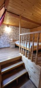 Postel nebo postele na pokoji v ubytování Apartamenty i Domki Biały Dunajec