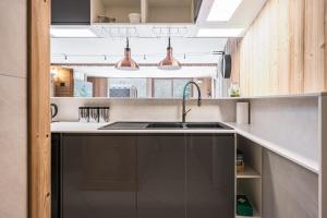 Kuchyň nebo kuchyňský kout v ubytování Chalet Delphine