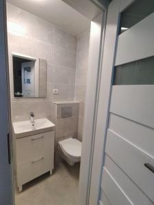 Koupelna v ubytování Dom Gościnny Koliber nad morzem w Darłówku