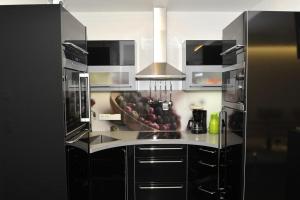 Kuchyň nebo kuchyňský kout v ubytování Appartement Silbermond
