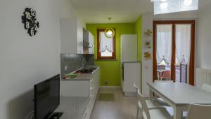 Φωτογραφία από το άλμπουμ του Colico Polti lake view and pool apartment σε Colico