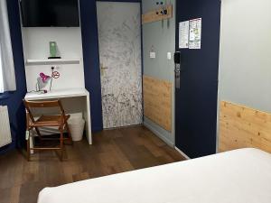 Postel nebo postele na pokoji v ubytování greet hotel Lille Gare Flandres - Groupe Accor