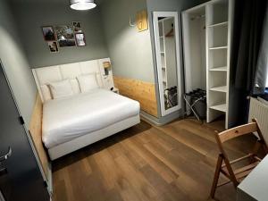 Postel nebo postele na pokoji v ubytování greet hotel Lille Gare Flandres - Groupe Accor