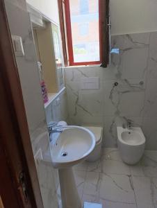 Ένα μπάνιο στο Villa Matassa 4 appartamenti vista mare in San Menaio +89 φωτογραφίες