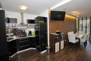 Kuchyň nebo kuchyňský kout v ubytování Appartement Silbermond