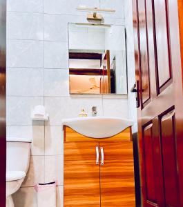 Bagno di Coconut Pointe Villa & Beach Resort