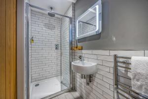 a bathroom with a sink and a shower at rooms@73 in Waterlooville