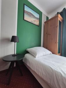 Posteľ alebo postele v izbe v ubytovaní Apartamenty Amadeus