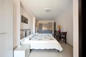 Cama ou camas em um quarto em Hotel San Martino