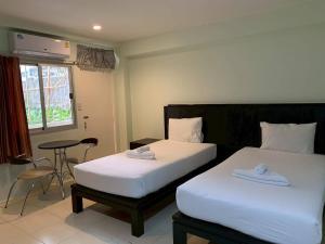 Katil atau katil-katil dalam bilik di Orm Thong Hotel - SHA Plus +46 gambar