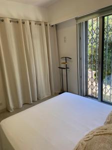 Кровать или кровати в номере Bahia +2 фотографии