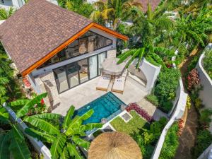 an overhead view of a house with a swimming pool at Paje Emerald Escapes in Paje