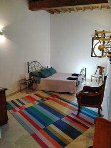 Postel nebo postele na pokoji v ubytování Gites Torreillans - Chambre Azur